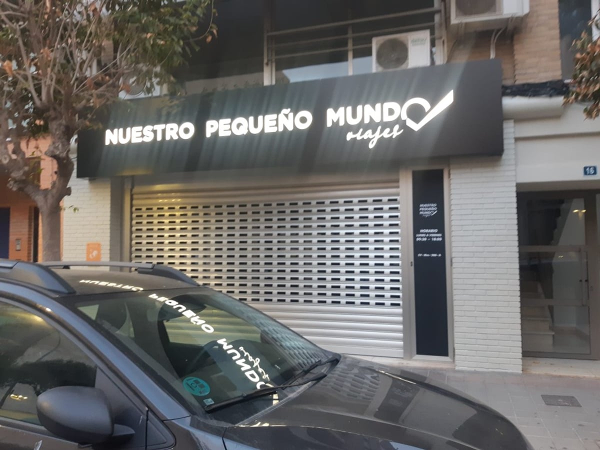 Rótulo luminoso Nuestro Pequeño Mundo